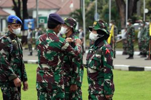 Danseskoal mencopot pita pada sebagai tanda latihan kepemimpinan Pasis telah berakhir.